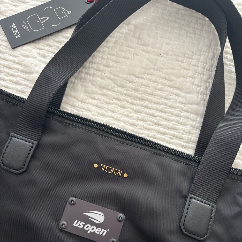 Tumi US Open Voyager Just in Case Black Tote Bag with Gold Accents